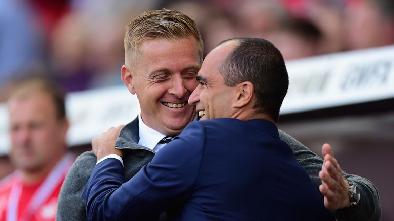 Garry Monk and Roberto Martinez say hello