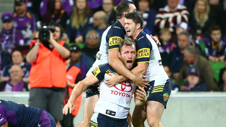 Gavin Cooper celebrates one of his two tries for North Queensland Cowboys against Melbourne Storm