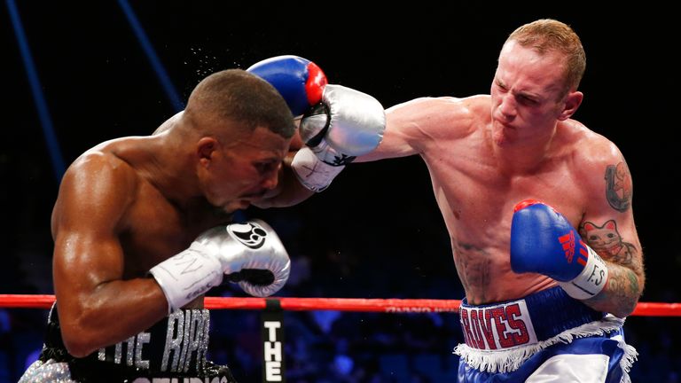 George Groves throws a right at Badou Jack during their WBC super middleweight title fight at MGM