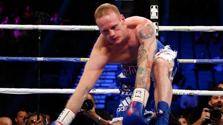 George Groves kneels on the mat after being knocked down by Badou Jack