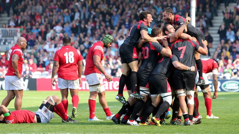 GLOUCESTER, ENGLAND - SEPTEMBER 19:  Georgia team celebrate their victory over Tonga during the Group C: Rugby World Cup 