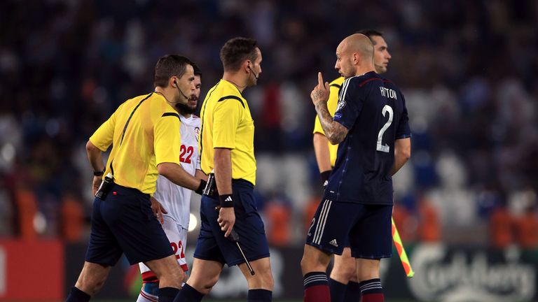 Scotland's Alan Hutton speaks to the officials during the UEFA European Championship Qualifying match at the Boris Paichadze Dinamo Arena, Tbilisi