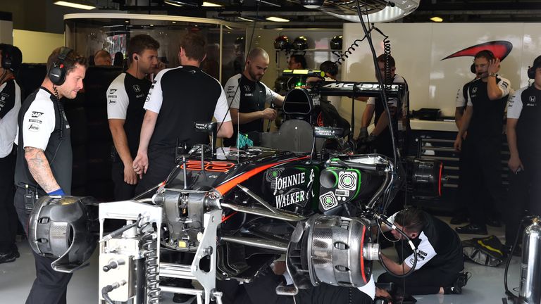 Jenson Button's day came to an early end due to a dislodged water hose