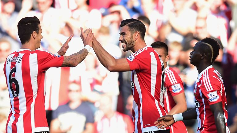 Graziano Pelle celebrates with team mates