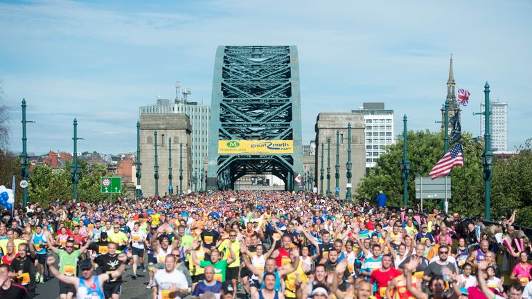 Runners cross the Tyne Bridge during the 2015 Great North Run, Newcastle.