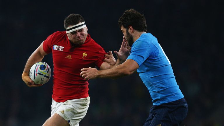 Guilhem Guirado of France hands off Luke McLean of Italy during the 2015 Rugby World Cup Pool D 