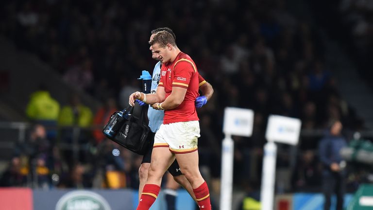 Wales' Hallam Amos leaves the field of play with an injury during the Rugby World Cup match v England at Twickenham Stadium, London