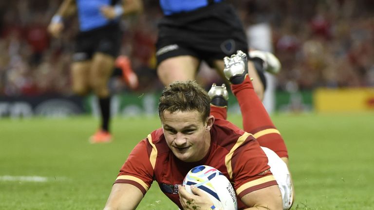 Hallam Amos scores Wales's fifth try during the Pool A match against Uruguay. 