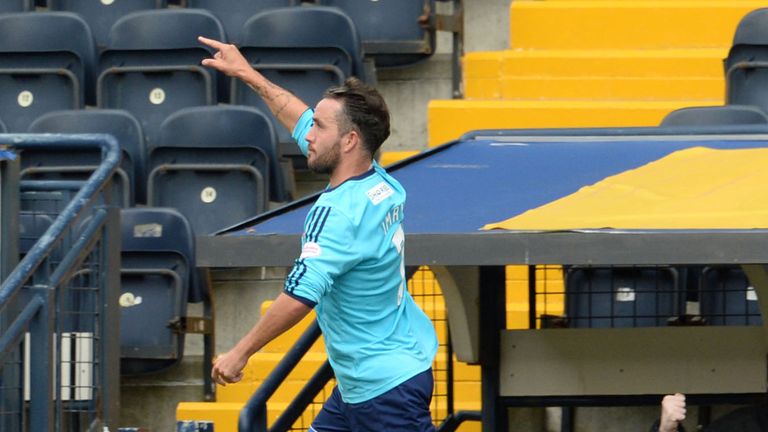 Dougie Imrie races off to celebrate after grabbing the equalising goal for Hamilton at Kilmarnock