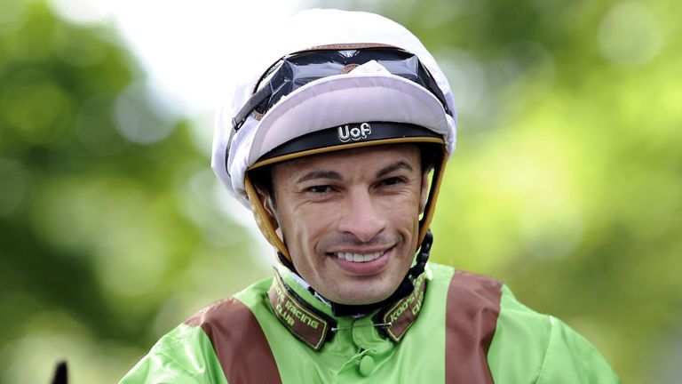 Balty Boys and Silvestre De Sousa return to the winner's enclosure after their win in the Betfred.com Superior Mile at Haydock.