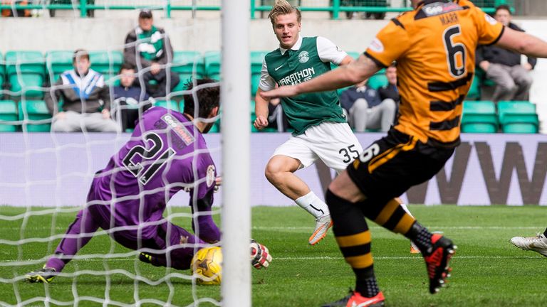 Jason Cummings (35) fires Hibs into a two-goal lead at Easter Road