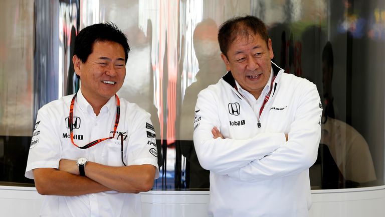 Yasuhisa Arai (L) in the McLaren garage
