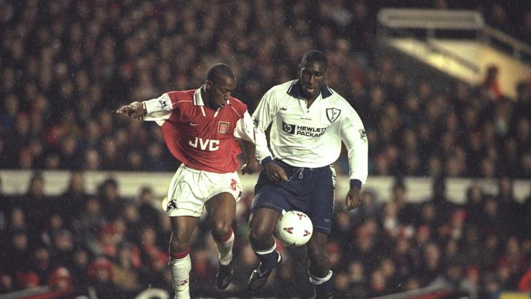 24 Nov 1996:  Ian Wright of Arsenal (left) tangles with Sol Campbell of Tottenham during the FA Carling premier league match between Arsenal and Tottenham