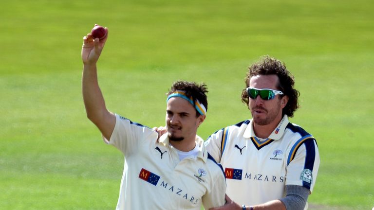 LEEDS, ENGLAND - SEPTEMBER 01:  Jack Brooks (L) of Yorkshire celebrates with Ryan Sidebottom after taking the wicket of Luke Ronchi of Somerset during the 