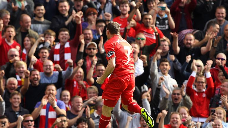 Liverpool's English midfielder James Milner celebrates after scoring against his old club 