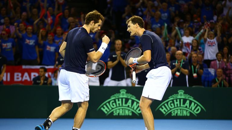 Jamie Murray (R) and Andy Murray of Great Britain celebrate a point during Day Two of the Davis Cup Semi Final match bet