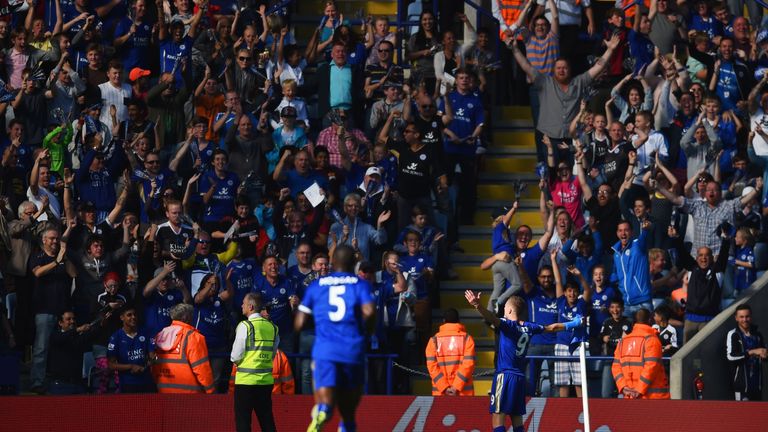 Jamie Vardy of Leicester City celebrates scoring his team's first goal against Arsenal