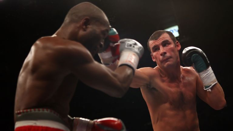 Joe Calzaghe connects with a right to the face of Bernard Hopkins during their light heavyweight bout in 2008. 