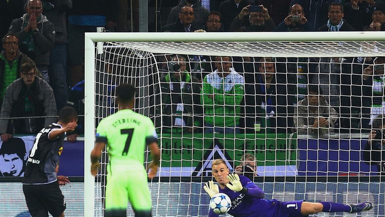 Joe Hart of Manchester City saves the penalty from Raffael of Borussia Monchengladbach 