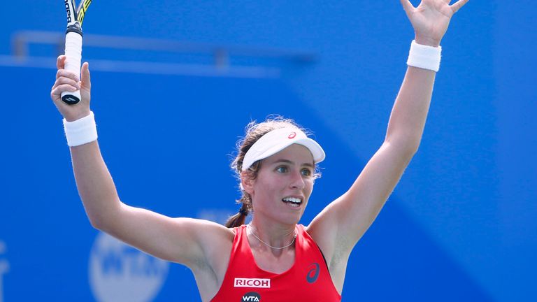 Johana Konta of Great Britain celebrates after beating Andrea Petkovic on day one of the Wuhan Open