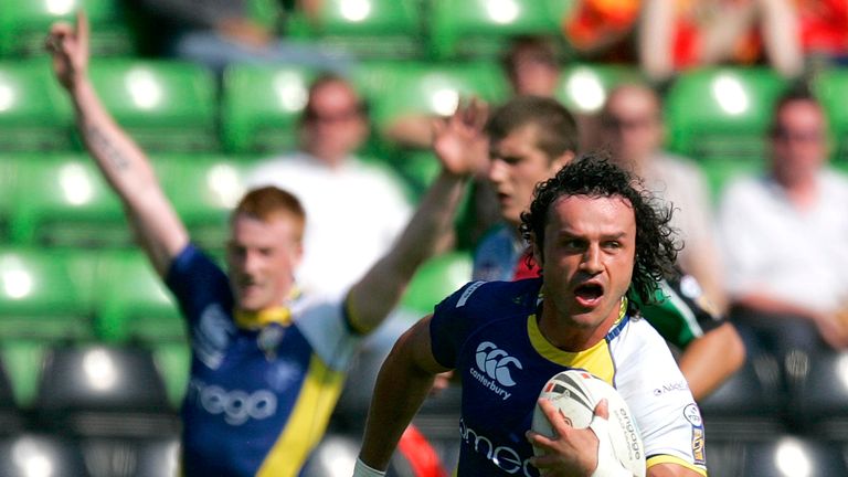 Jon Clarke of Warrington Wolves scores his sides try during the engage Super League match between Harlequins RL and Warrington