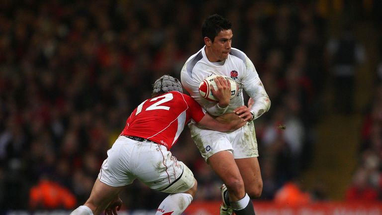 Jonathan Davies tackles Shontayne Hape during Wales' Six Nations loss to England at the Millennium Stadium in 2011
