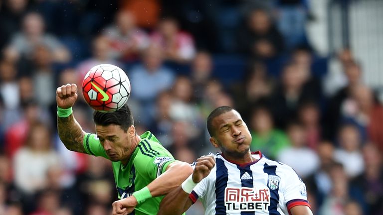 Jose Fonte of Southampton wins a header from Salomon Rondon of West Bromwich Albion
