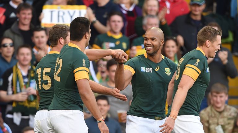 South Africa's JP Pietersen (second right) celebrates his try during the Rugby World Cup match v Samoa at Villa Park, Birmingham.