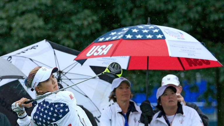Juli Inkster watches Michelle Wie practice ahead of the Solheim Cup