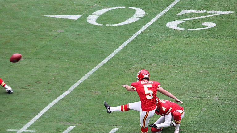 Cairo Santos #5 of the Kansas City Chiefs kicks a 23 yard extra point against the Houston Texans in the first quarter in a NFL 