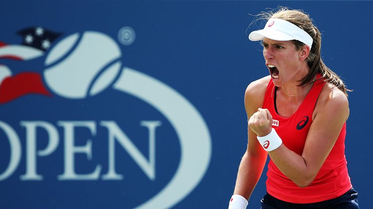 Johanna Konta of Great Britain reacts during her Women's Singles Second Round match against Garbine Muguruza