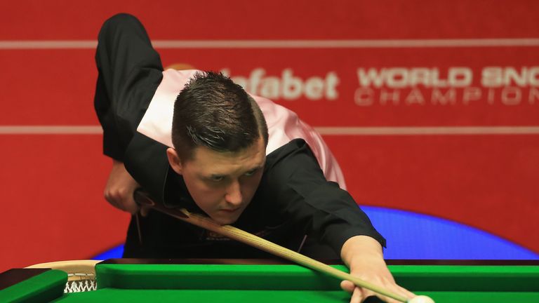 SHEFFIELD, ENGLAND - APRIL 22:  Kyren Wilson of England in action agsint Ricky Walden of England during day four of the The Dafabet World Snooker Champions