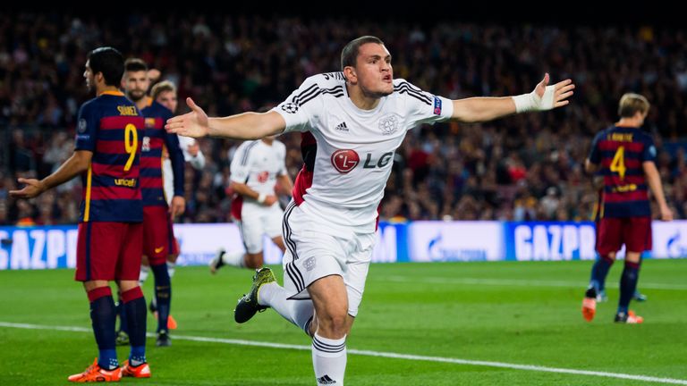 BARCELONA, SPAIN - SEPTEMBER 29:  Kyriakos Papadopoulos of Bayer 04 Leverkusen celebrates after scoring the opening goal during the UEFA Champions League G
