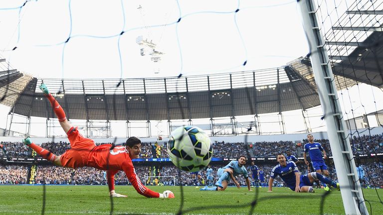 MANCHESTER, ENGLAND - SEPTEMBER 21: Frank Lampard of Manchester City scores the equalising goal past Thibaut Courtois of Chelsea during the Barclays Premie