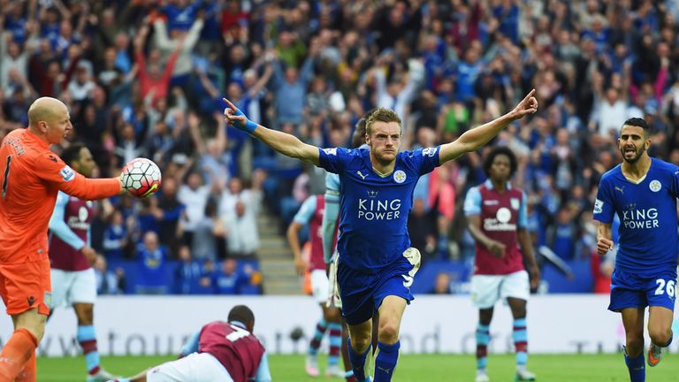 Jamie Vardy celebrates after sliding home Leicester's equaliser