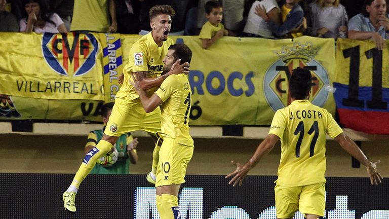 Leonardo Baptistao (c) cebelrates his his Villarreal team-mates after scoring the winner v Atletico Madrid