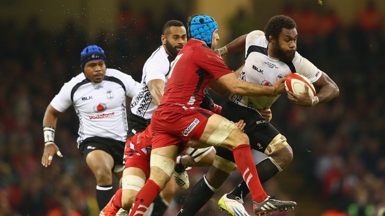 Leone Nakarawa of Fiji is held up by Wales' Justin Tipuric at the Millennium Stadium