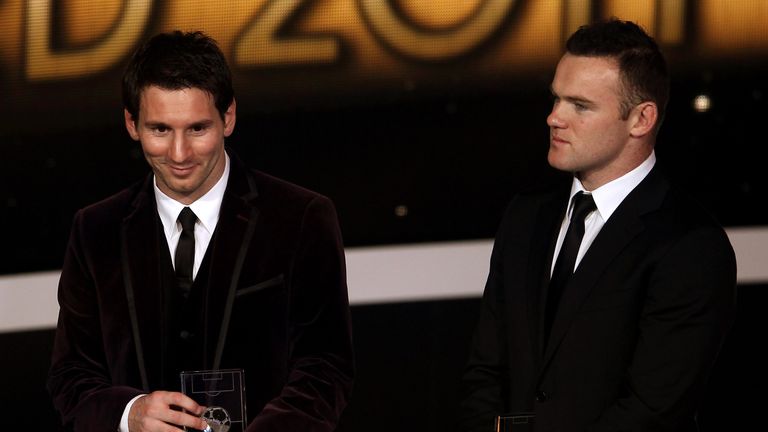Lionel Messi of Barcelona (L) with Wayne Rooney of Manchester United during the FIFA Ballon d'Or Gala 2011 on January 9, 2012