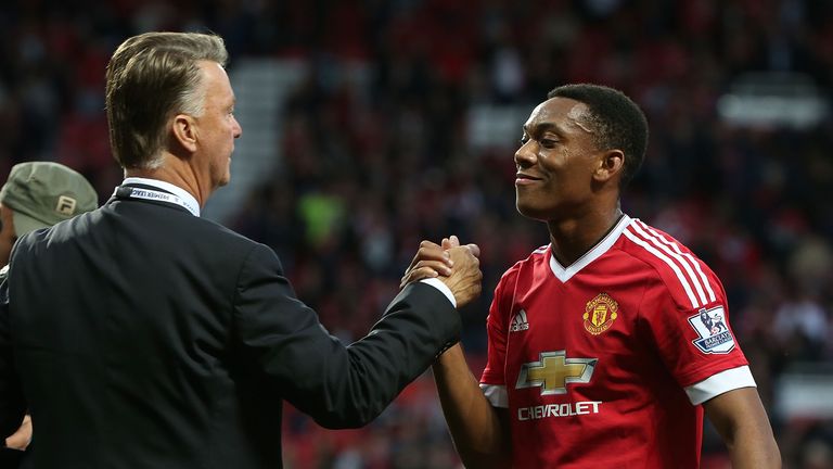 Louis van Gaal congratulates Anthony Martial after the Premier League match between Manchester United and Liverpool