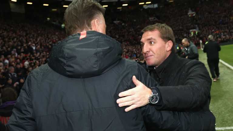  Louis van Gaal of Manchester United greets Brendan Rodgers of Liverpool ahead of the Premier League match at Old Trafford on December 14, 2014