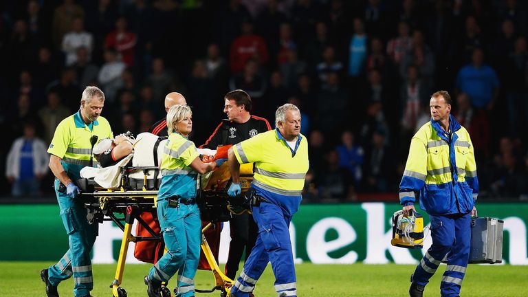Luke Shaw of Manchester United leaves the field on a stretcher