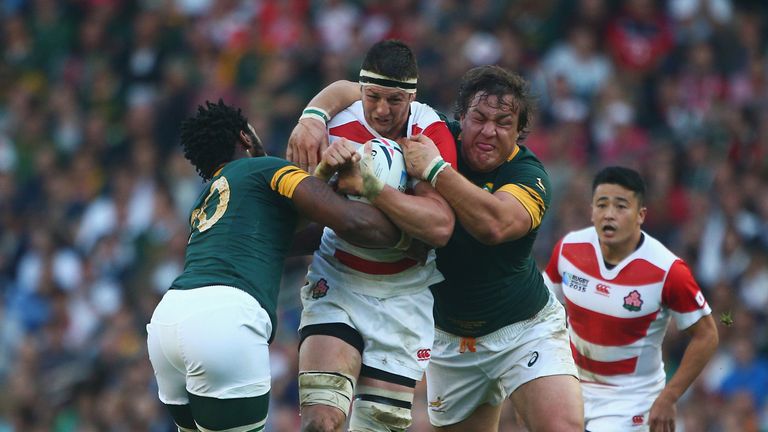  Luke Thompson of Japan drives through the South Africa defence 