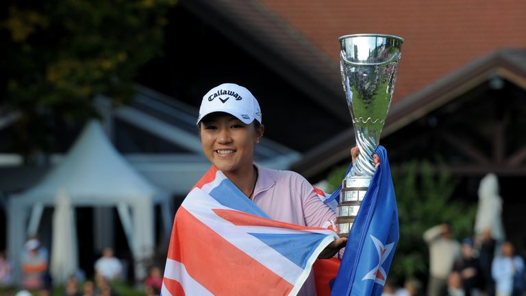 Lydia Ko celebrates with the trophy after her record breaking win