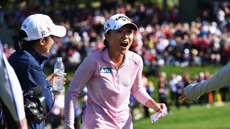 Lydia Ko celebrates her victory at the Evian Championship
