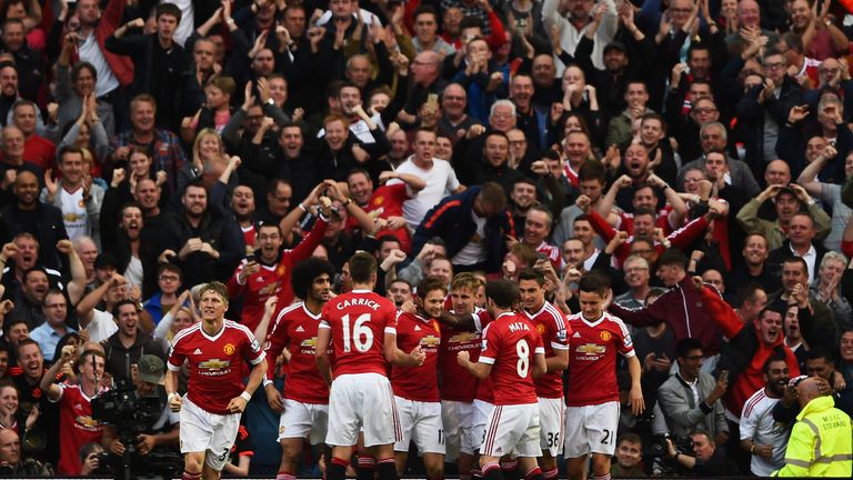MANCHESTER, ENGLAND - SEPTEMBER 12: Daley Blind of Manchester United celebrates scoring the opening goal with team mates during the Barclays Premier League