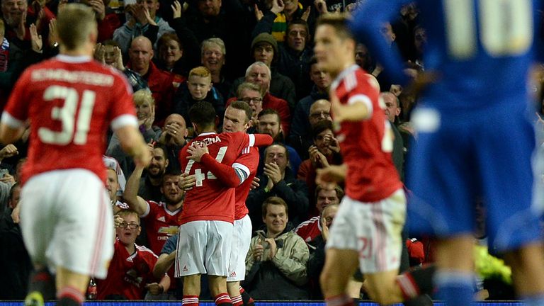 Manchester United's Wayne Rooney celebrates scoring his team's first goal of the game