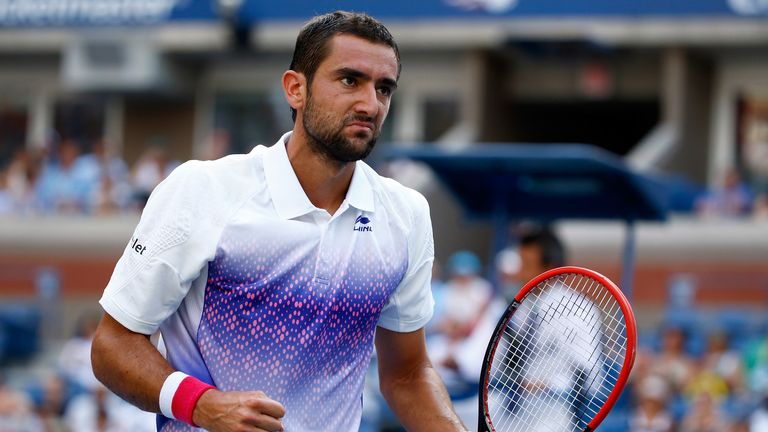Marin Cilic of Croatia reacts in his match against Jo-Wilfried Tsonga of France during their Men's Singles Quarter-finals match at the US Open.