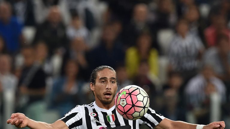 TURIN, ITALY - SEPTEMBER 12:  Martin Caceres of Juventus FC in action during the Serie A match between Juventus FC and AC Chievo Verona at Juventus Arena o