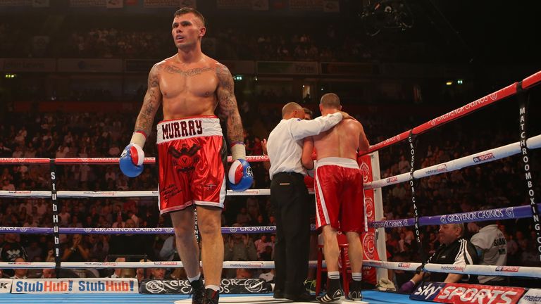MANCHESTER, ENGLAND - JULY 18: Martin Murray makes his way back to his corner after the referee stopped the fight against Mirzet Bajrektarevic during their