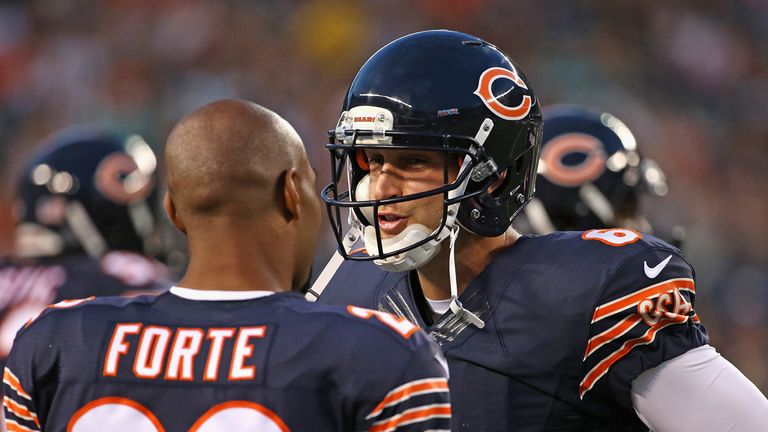 CHICAGO, IL - AUGUST 13: Jay Cutler #6 of the Chicago Bears talks with Matt Forte #22 during a preseason game against the Miami Dolphinsnat Soldier Field o